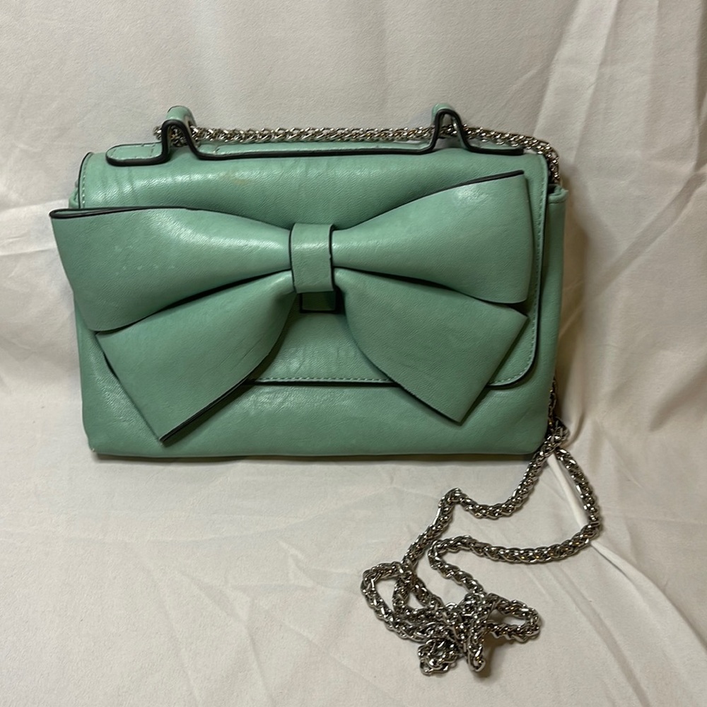 Teal Crossbody Bag with Silver Chain Strap and Bow Detail on the Front